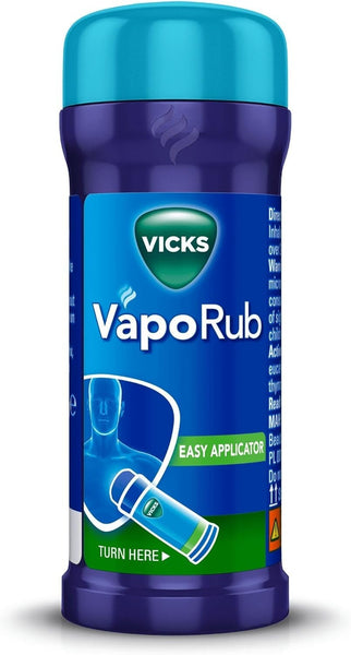 A 35g Vicks VapoRub Easy Applicator features a blue cap, purple body, and green VICKS logo. An illustration shows how to twist the base for easy, soothing respiratory relief.