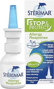 The Sterimar Stop and Protect - Allergy Response Nasal Spray features a blue nozzle and is packaged in a box with a dolphin logo. This non-drowsy spray, from the brand Sterimar, uses natural sea water for rapid relief and allergen protection.