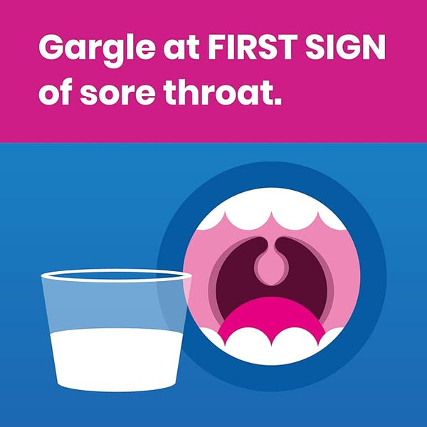 Illustration with a pink and blue background shows a glass of liquid and an open mouth. Text reads: Use Oraldene Medicated Antibacterial (200ml) by Oraldene at FIRST SIGN of sore throat or mouth ulcers.