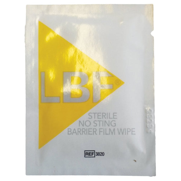 A white packet with a yellow triangle and LBF in bold letters reads Sterile No Sting Barrier Film Wipe for skin protection, with REF 3820 at the bottom. The product is CliniMed LBF Barrier Film Foam Applicator (1ml x 5pcs).