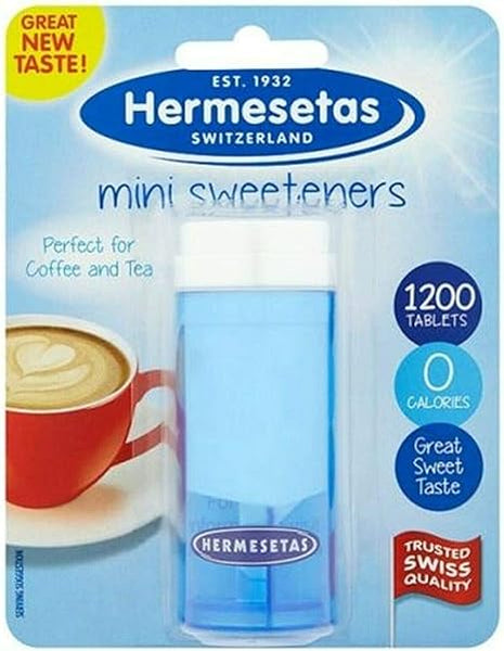 Hermesetas Mini Sweeteners (1200 Tablets) offers Great New Taste with 0 calories. Perfect for coffee and tea, these sweeteners boast Trusted Swiss Quality, all set against a cozy coffee cup backdrop.