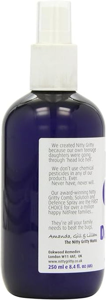 A close-up of a Nitty Gritty Defence Spray (250ml) bottle shows its dark blue color and white pump. The label emphasizes non-chemical ingredients, lice prevention efficacy, and child safety. Contact details for Nitty Gritty are included.