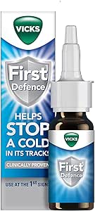 An image showcases a Vicks First Defence Cold Virus Blocker Nasal Spray Bottle (15ml) with its packaging. The box reads: Helps stop a cold in its tracks and Clinically proven Cold Virus Blocker. Both items feature a blue design with the Vicks logo.