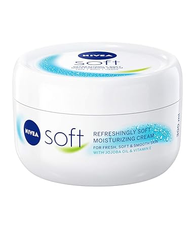 A 300ml Nivea Soft Moisture Cream Pot features a white container with a blue Nivea logo on the lid and splash graphics. Promising fresh, soft, and smooth skin, its enriched with jojoba oil and vitamin E.