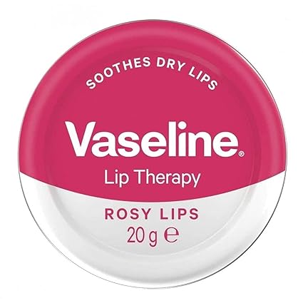 A round, white-bottomed Vaseline Lip Therapy Rosy container has a pink lid stating Soothes dry lips, containing 20g.