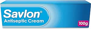 The 100g blue box of Savlon Antiseptic Cream is a must-have for your first aid kit due to its effective germ-killing properties.