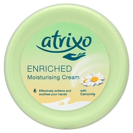 The Atrixo Enriched Cream (200ml) comes in a green container with a daisy-adorned lid. It features text stating Effectively moisturizes, softens and soothes your hands alongside a hand logo, and includes natural camomile for softening hands.