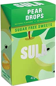 The 42g Sula Sugar Free Sweets - Pear Drops box, in green and yellow, features pear illustrations and contains no preservatives. With natural flavors and real pear juice, it promises a delightful experience with every bite.