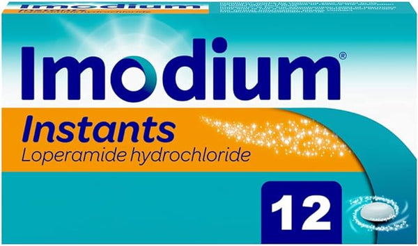 Imodium Instants 12 tablets swiftly relieve diarrhea, packaged in eye-catching blue and orange with Loperamide hydrochloride text and a sparkling front design for fast, effective relief.