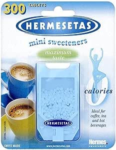 Hermesetas Mini Sweeteners (300 tablets) packaging displays two coffee cups and the phrase maximum taste, zero calories. Designed for diabetics, these zero calorie sweeteners are perfect for coffee, tea, and hot beverages.