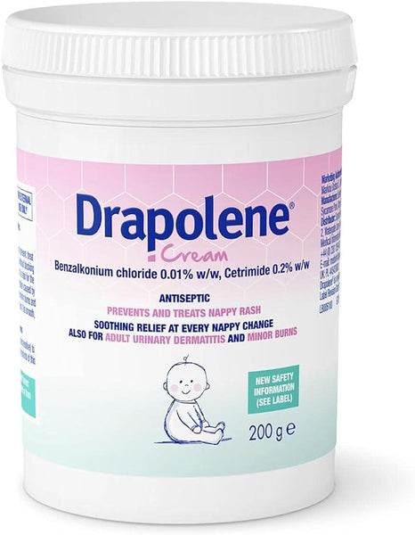 A 200g tub of Drapolene Antiseptic Cream displays a white and pink label with blue text and a baby illustration. It contains benzalkonium chloride and cetrimide, suitable for nappy rash, urinary dermatitis, and minor burns.