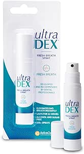 The UltraDex Fresh Breath Oral Spray (9ml) features sleek white packaging with blue and green accents. It eliminates bad breath, providing 12-hour freshness. The spray is displayed next to its cap and is highly recommended by dentists.