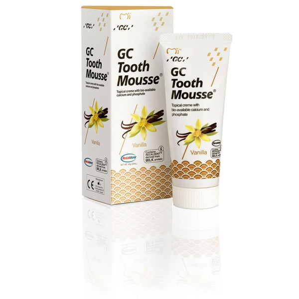 The GC Tooth Mousse: Vanilla (40g) by GC, featuring Recaldent for enhanced tooth protection, is a topical cream with calcium and phosphate. Its box showcases a vanilla flavor with an illustrated vanilla flower and honeycomb pattern.