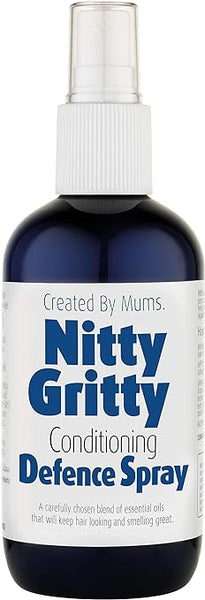 The Nitty Gritty Defence Spray (250ml) has a blue bottle, white label with blue text, and a soothing lavender scent. The label states its Created By Mums and emphasizes its essential oil blend for hair care and lice prevention.