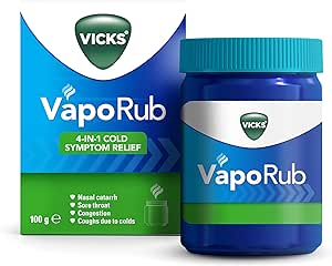 Image of Vicks Vaporub Ointment (100g) with soothing eucalyptus and menthol. The package promotes 4-in-1 relief for nasal catarrh, sore throat, congestion, and coughs due to colds. The jar is blue with a green lid.