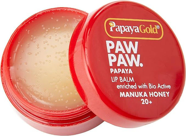 An open red PapayaGold Paw Paw Balm Pot, revealing smooth topical balm, highlights Papaya enriched with Bio Active Manuka Honey 20+ on its label.