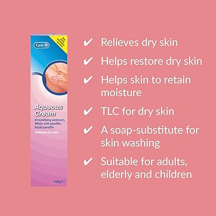 A pink background showcases a box of Care Aqueous Cream (100g) on the left. On the right, benefits are listed: relieves dry skin, helps restore skin, eases irritation, provides TLC for dry skin, acts as a soap substitute, and is suitable for all ages.