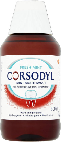 A 300ml bottle of Corsodyl Alcohol-Free Mint Mouthwash features a white label with its logo and benefits. It contains chlorhexidine digluconate to address gum disease, including bleeding, irritation, and ulcers. The bottle has a white cap.