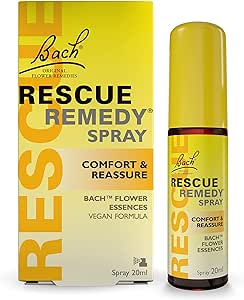 A yellow and brown package of Bach Rescue Remedy Spray (20ml) by Rescue is next to the spray bottle. The packaging features Comfort & Reassure, Bach Flower Essences, and Vegan Formula. Perfect for stressful moments, it offers essential emotional support.