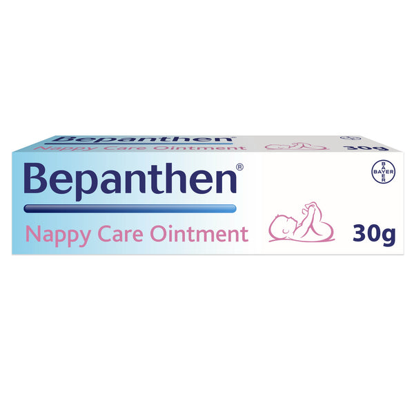 A rectangular box of Bepanthen Nappy Care Ointment (30g) shows a baby lying down. Its blue and white packaging with pink accents highlights the pro vitamin B5 formula for nappy rash protection, featuring the Bayer logo on the top right corner.