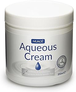 The 500g Nuage Aqueous Cream, designed for dry skin, is a fragrance-free and paraben-free moisturizer. It is labeled with certification logos and effectively softens and hydrates.