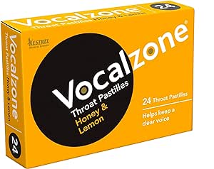 The Vocalzone Honey and Lemon box contains 24 pastilles for throat irritation relief. Its bold, circular design includes the text Helps keep a clear voice. The yellow packaging highlights its honey and lemon flavor.