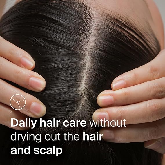 Close-up of a persons scalp with shiny, clean hair parted in the middle, gently held to show care. Text on image reads, Seba Med Shampoo 200ml uses Piroctone Olamine at pH 5.5 to keep your hair and scalp hydrated while combating dandruff and flaky scalp.