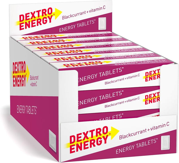 The Dextro Energy Tablets-Blackcurrant (24 Packs) boosts energy with every dose. The vibrant purple and white open display box neatly presents individually labeled packs of Dextro Energy, promoting a refreshing boost enriched with Vitamin C.