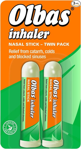 Image of the Olbas Inhaler Nasal Stick Twin Pack from Olbas, showcasing two sticks in orange and green packaging. Advertises Essential Oils For Effective Relief against nasal congestion, catarrh, colds, and blocked sinuses.
