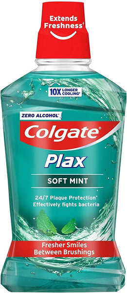 Colgate Plax Soft Green Mint Mouthwash (500ml) features a red cap, Zero Alcohol and Extends Freshness on the label, offering 24/7 antibacterial plaque protection. The design includes mint leaves and a water splash on a teal backdrop, making it essential for oral health.