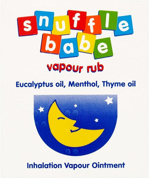 The image shows a Snufflebabe product label for Snuffle Babe Vapour Rub (24g) with vibrant block letters. It mentions natural essential oils such as eucalyptus, menthol, and thyme oil for nasal congestion relief. Below is a smiling crescent moon with stars and the text Inhalation Vapour Ointment.