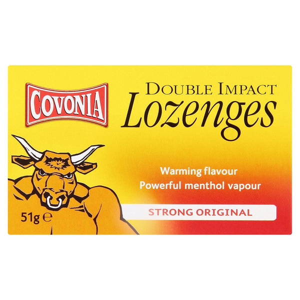 A yellow and red box of Covonia Double Impact Lozenges- Strong Original (51g), featuring a bull illustration, promises powerful flavours with text: Warming flavour, mentholated vapour.