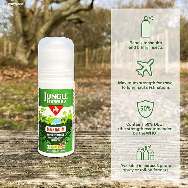 A 50ml Jungle Formula Maximum Roll-On insect repellent with a 50% DEET formula rests on a wooden surface outdoors. Ideal for long-haul travel, its available in aerosol, pump spray, or roll-on formats. Trees provide the backdrop.