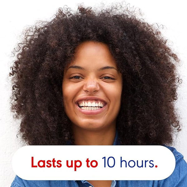 A smiling person with curly hair is set against a white background. White and red text at the bottom reads, Otrivine Decongestant Nasal Spray (10ml) provides congestion relief for up to 10 hours.