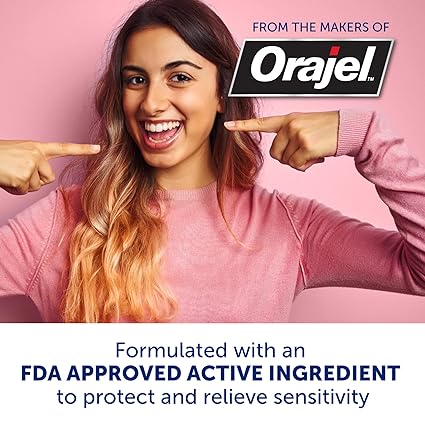 A person in a pink sweater points to their mouth, highlighting Arm & Hammer Sensitive Toothpastes benefits: it features an FDA-approved ingredient designed for sensitive teeth, providing relief and cavity protection.