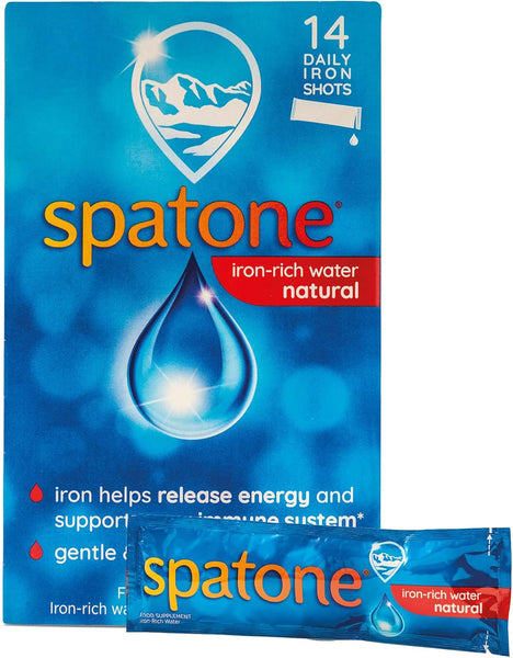 A blue box of Spatone Iron Natural (14 Sachets) by Spatone shows a mountain logo, water droplet, and the claims “14 daily iron shots,” “iron helps release energy,” and “gentle & easily absorbed.” A sachet appears on the packaging.