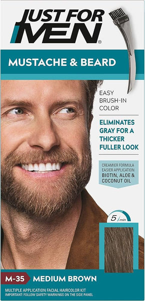 A smiling man with brown hair and a beard appears on the Just For Men Brush In Gel Medium Brown (1) box. The packaging highlights the product’s ability to effectively cover grey hair for a fuller look and features the shade Medium Brown (M-35). A brush applicator and color sample are included, showcasing the natural results of this moustache and beard dye from Just For Men—an ideal choice for those seeking medium brown facial hair coverage.