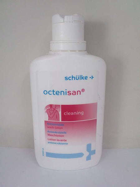 A 150ml white bottle of Octenisan Antimicrobial has a pink label, is soap-free, and features a flip-top cap. It provides product information in multiple languages and essential skin protection.