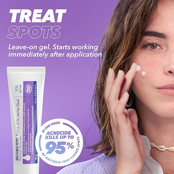 A woman applies Galdermas Acnecide Face Gel 5% 15g to her cheek. Set against a purple background, the gel offers immediate action against breakouts. With benzoyl peroxide, Acnecide is your go-to for clearer skin. A tube of the gel features prominently on the left.