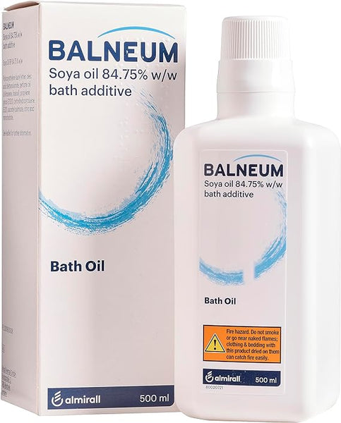 A 500ml bottle and box of Almiralls Balneum Bath Oil, ideal for dry, sensitive skin with 84.75% soya oil for moisturization. Packaging warns against smoking or naked flames. Both the bottle and box feature similar designs and branding.