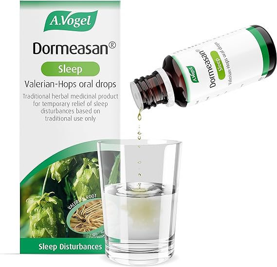 A bottle of A.Vogel Dormeasan Sleep Oral Drops (50ml) pours liquid into a glass, highlighting its valerian root benefits for temporary sleep disturbance relief.