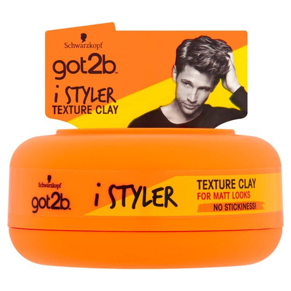 A 75ml orange container of Schwarzkopf Got2B iStylers Texture Clay features a black-and-white photo of a man with styled hair and highlights a natural matte finish, flexible hold, and no stickiness.