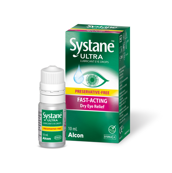 A 10 ml bottle of Systane Ultra UD lubricant eye drops rests beside its green-and-white box, boasting Preservative-Free and Fast-Acting Dry Eye Relief, with both showcasing the trusted Systane brand.