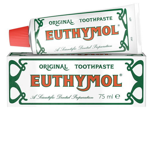 A 75ml tube of Euthymol Toothpaste, featuring a distinctive red cap, sits on its matching box with green designs and the slogan A Scientific Dental Preparation, emphasizing its antiseptic ingredients and fluoride-free formula.