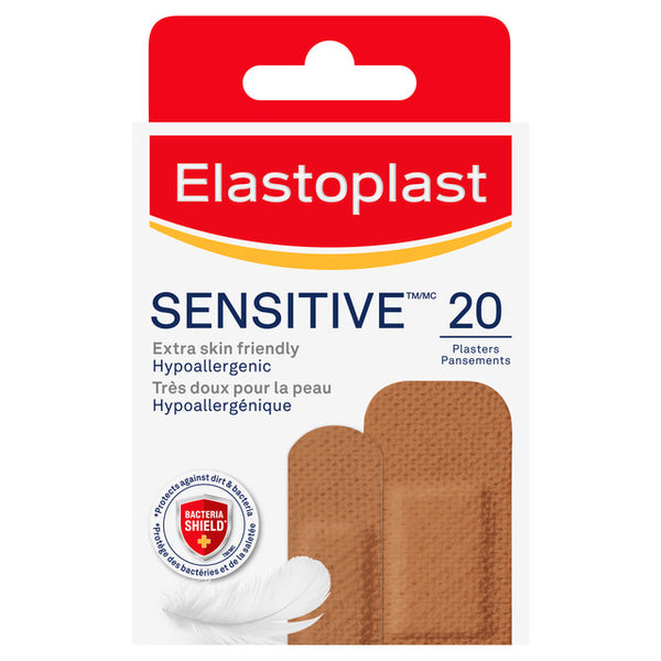 Elastoplast Sensitive Hypoallergenic Plasters (20) offer gentle wound protection for sensitive skin. The packaging features a feather and Bacterial Shield logo, with partially visible brown plasters, and highlights Extra skin friendly, Hypoallergenic in English and French.