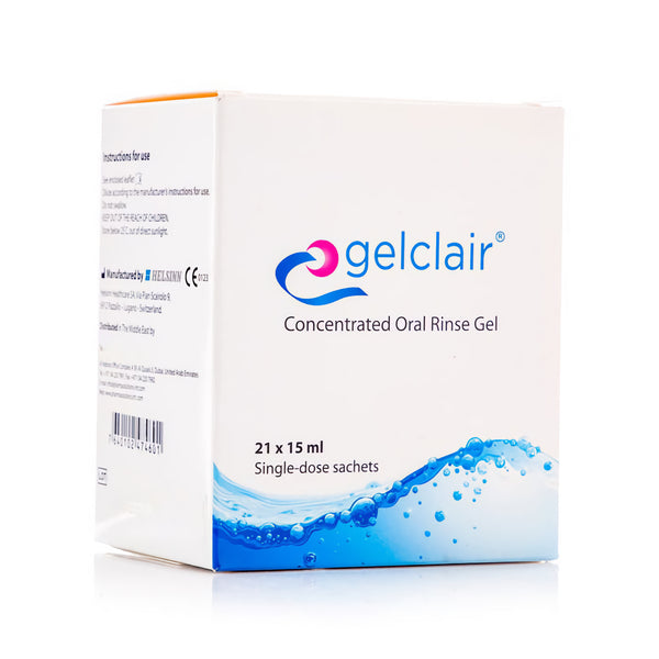 The image shows a box of Gelclair Concentrated Oral Rinse Gel 15ml, ideal for soothing mouth ulcers and oral mucositis. The white packaging with blue water splash graphics contains 21 single-dose sachets by the brand Gelclair.