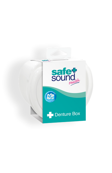 A white Safe and Sound Denture Box (1 Box) in branded packaging with a blue and green design, cross symbol, and text showing it is a storage case for dentures.