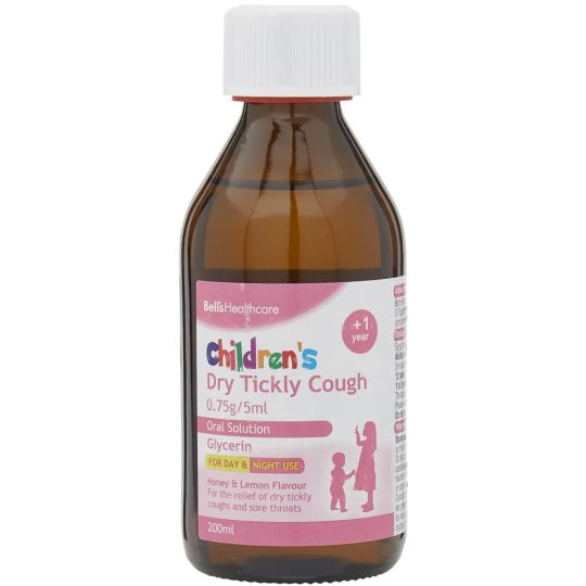 A 200ml bottle of Bells Childrens Dry Tickly Cough Solution, with a pink and white label, suitable for children over 1 year. Contains glycerin with honey and lemon flavor to soothe sore throats. Brand: Bells.