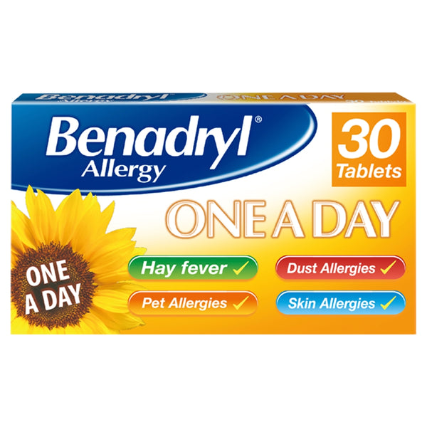 The image depicts a Benadryl One a Day box with 30 tablets, adorned with a sunflower. Its labeled One a Day and effectively addresses hay fever, pet, dust, and skin allergies using cetirizine dihydrochloride.