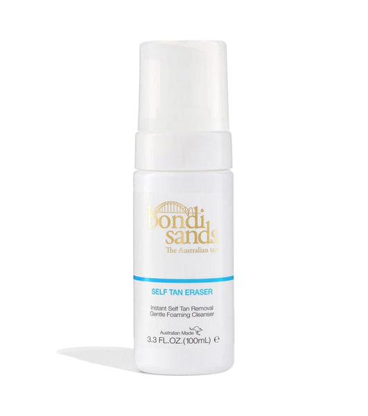 A Bondi Sands Self Tan Eraser (100ml) white bottle with a foaming pump, blue stripe, and gold-blue branding helps correct tanning mistakes and create a flawless base.